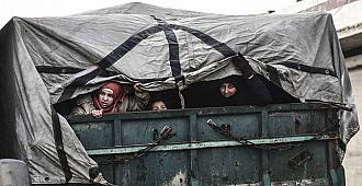 Suriye'de çaresiz siviller ısınmak…